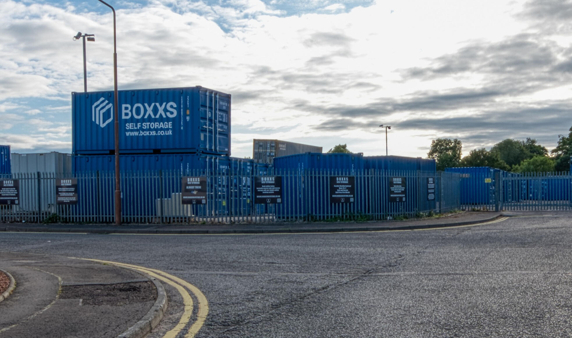 Boxxs self storage entrance with branded container at Linlithgow Alternate angle of Boxxs self storage container with painted logo at the Linlithgow entrance, highlighting secure access for Bo’ness and West Lothian customers